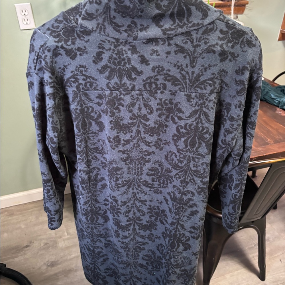 Black tunic dress with pockets, looks great with leggings, fits size large